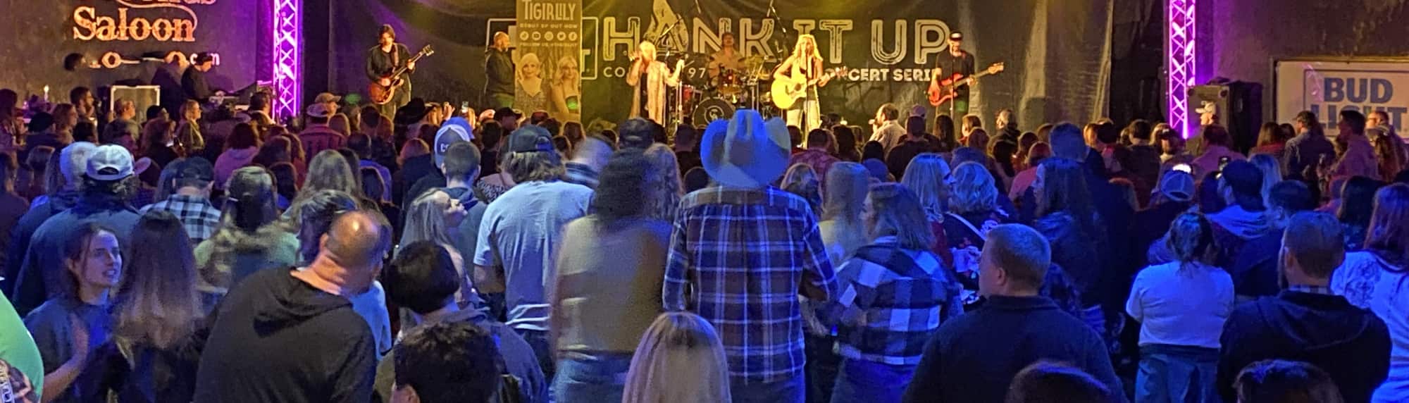 country concert with fans wearing cowboy hats Scranton